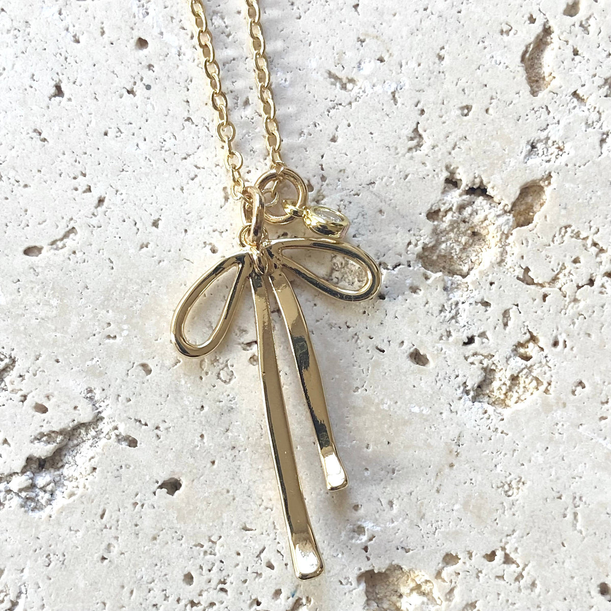 Droopy Ribbon Melted droopy ribbon bow charm necklace trendy – VB&Co. Designs Jewelry